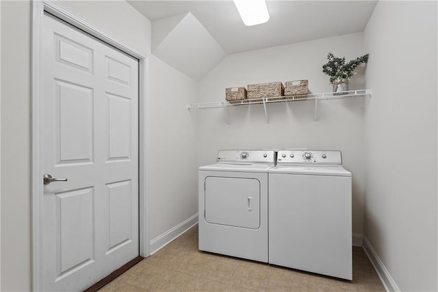 laundry area with independent washer and dryer