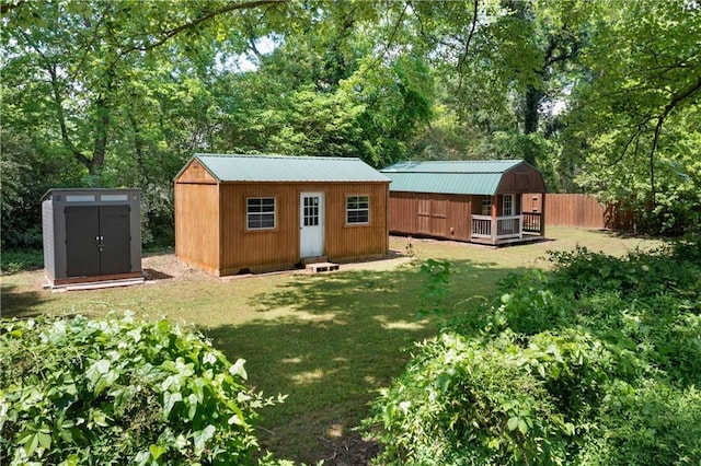 view of shed with fence