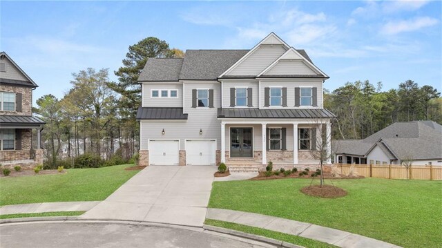 5424 Gallagher Ct, Powder Springs, GA 30127 - craftsman-style home featuring a porch, concrete driveway, an attached garage, a standing seam roof, and metal roof