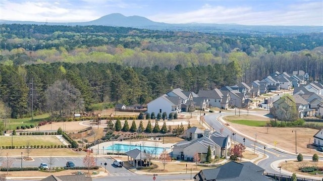 5424 Gallagher Ct, Powder Springs, GA 30127 - aerial view of residential area with a forest and a pool
