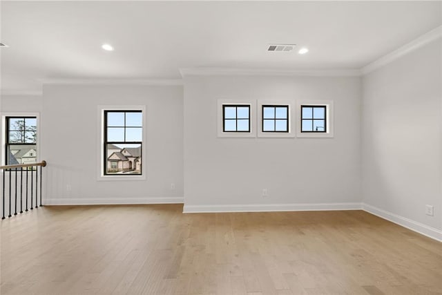 5424 Gallagher Ct, Powder Springs, GA 30127 - unfurnished room featuring ornamental molding, healthy amount of natural light, light wood-style floors, baseboards, and recessed lighting