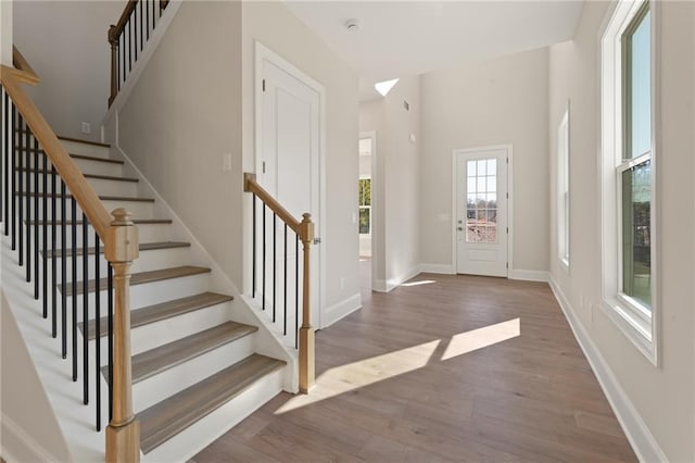 1025 Liberty Springs Dr, Woodstock, GA 30188 - entryway featuring wood finished floors and stairs