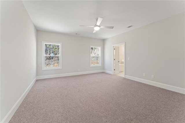 1025 Liberty Springs Dr, Woodstock, GA 30188 - empty room with light colored carpet and a ceiling fan