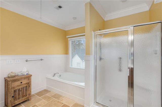 bathroom with a garden tub, visible vents, wainscoting, a stall shower, and crown molding