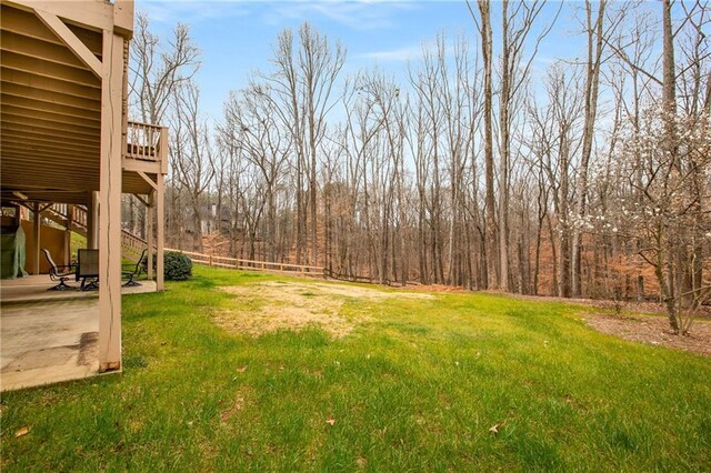 view of yard with a patio area and stairway