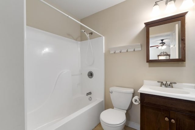 full bathroom featuring bathing tub / shower combination, ceiling fan, vanity, and toilet