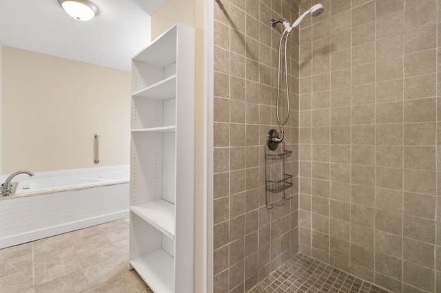 bathroom featuring tiled shower