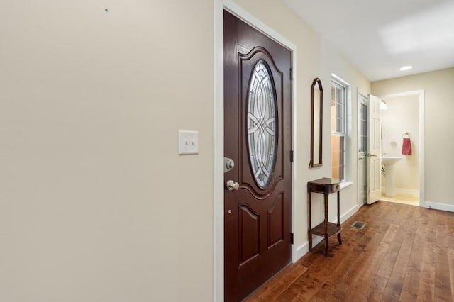 entrance foyer featuring hardwood / wood-style floors