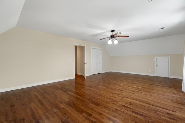 bonus room featuring lofted ceiling, ceiling fan, and dark hardwood / wood-style floors