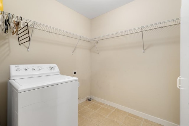 washroom with washer / clothes dryer