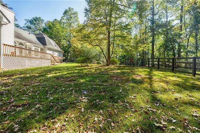 view of yard with a deck