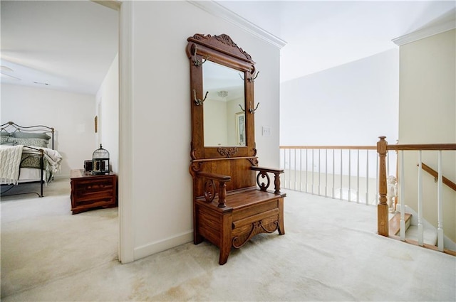 corridor featuring carpet flooring and ornamental molding