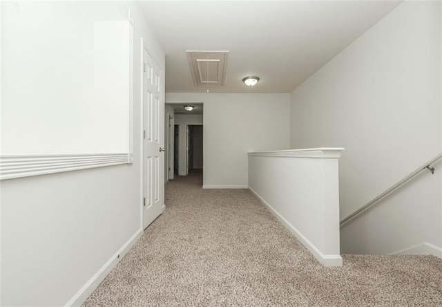 5260 Sherwood Way, Cumming, GA 30040 - hallway with attic access, carpet flooring, an upstairs landing, and baseboards