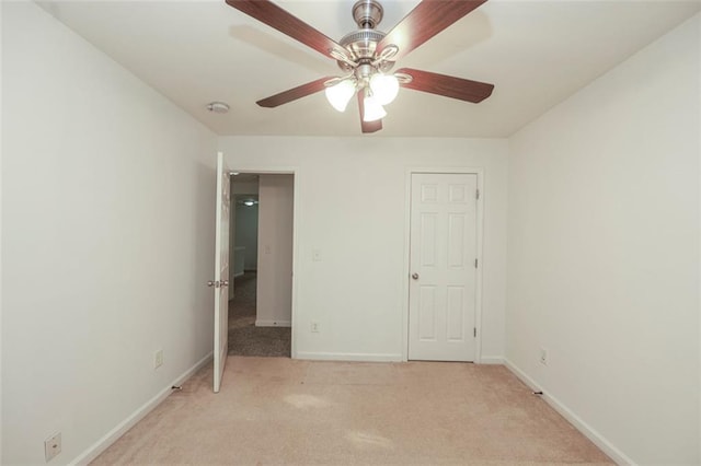 5260 Sherwood Way, Cumming, GA 30040 - unfurnished bedroom featuring light carpet, baseboards, and a ceiling fan