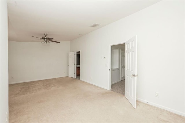 5260 Sherwood Way, Cumming, GA 30040 - unfurnished room featuring light colored carpet, a ceiling fan, and baseboards