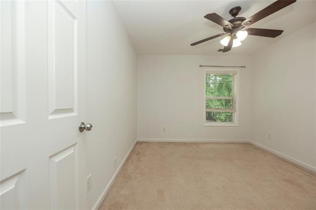 5260 Sherwood Way, Cumming, GA 30040 - unfurnished room with light carpet, baseboards, and ceiling fan