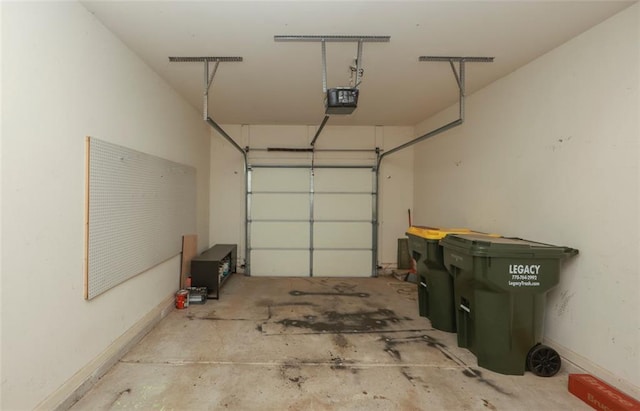 5260 Sherwood Way, Cumming, GA 30040 - garage with a garage door opener and baseboards
