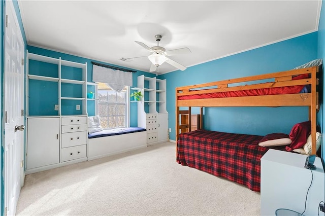 bedroom featuring ceiling fan and light carpet