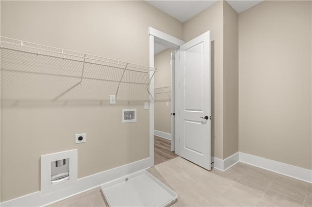 231 Laurel Vista Dr, Canton, GA 30114 - clothes washing area featuring washer hookup, hookup for an electric dryer, and baseboards