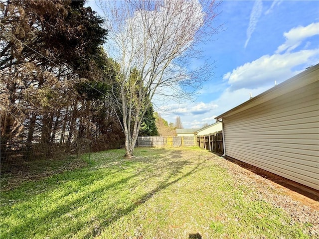 view of yard with fence