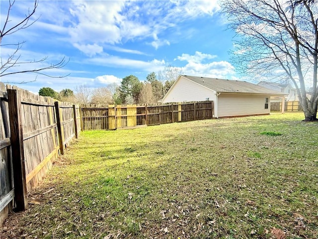 view of yard featuring a fenced backyard