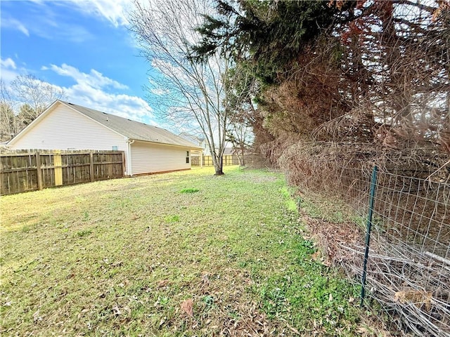 view of yard featuring fence