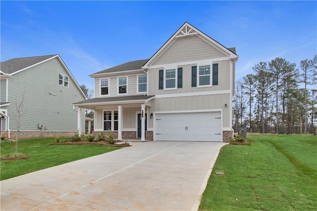 craftsman-style home with a front yard and a garage