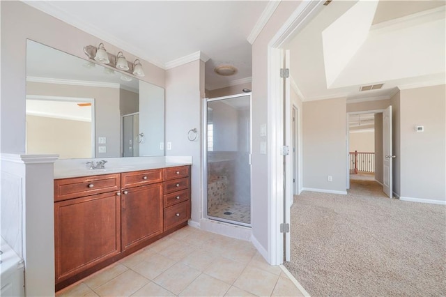 bathroom with vanity, an enclosed shower, and ornamental molding