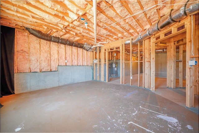 basement featuring electric water heater