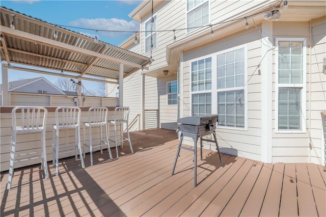 deck featuring a pergola