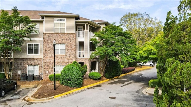 2700 Pine Tree Rd NE Unit 1214, Atlanta, GA 30324 - view of property with cooling unit