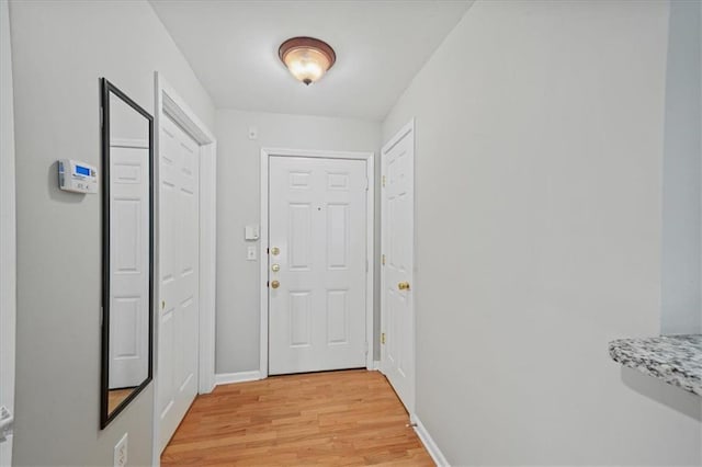 2700 Pine Tree Rd NE Unit 1214, Atlanta, GA 30324 - entryway featuring light wood-type flooring and baseboards