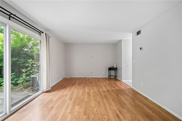 1810 Ashborough Rd SE Unit G, Marietta, GA 30067 - empty room featuring light wood-style flooring and baseboards