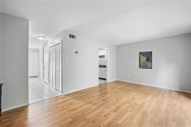 1810 Ashborough Rd SE Unit G, Marietta, GA 30067 - spare room with light wood-style floors and baseboards