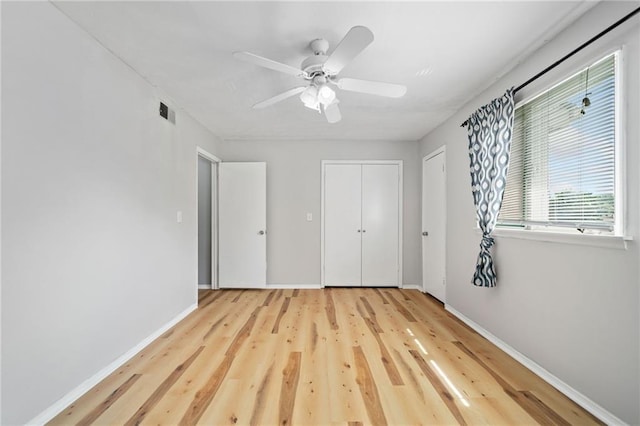 1810 Ashborough Rd SE Unit G, Marietta, GA 30067 - unfurnished bedroom featuring wood finished floors, ceiling fan, and a closet