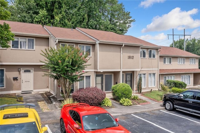 1810 Ashborough Rd SE Unit G, Marietta, GA 30067 - multi unit property with stucco siding and uncovered parking