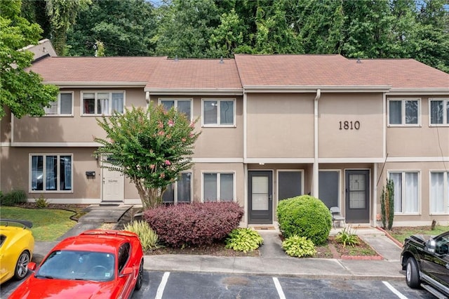 1810 Ashborough Rd SE Unit G, Marietta, GA 30067 - view of property featuring uncovered parking