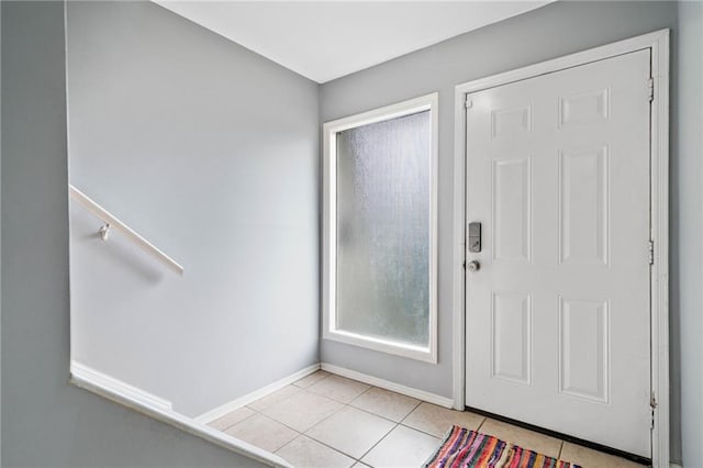1810 Ashborough Rd SE Unit G, Marietta, GA 30067 - foyer entrance with light tile patterned floors and baseboards