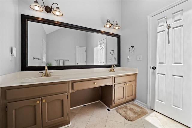 full bathroom featuring double vanity, a sink, and vaulted ceiling