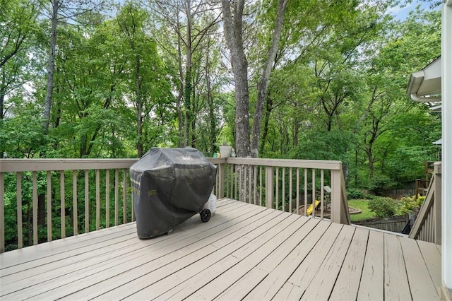 wooden deck with area for grilling