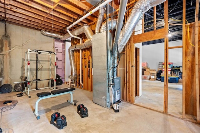 unfinished basement with heating unit