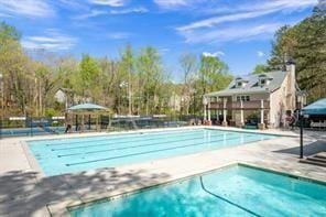 pool with a patio