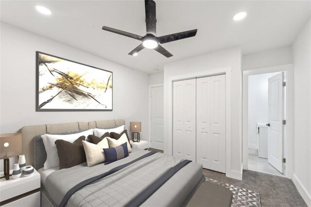 carpeted bedroom with a closet and ceiling fan