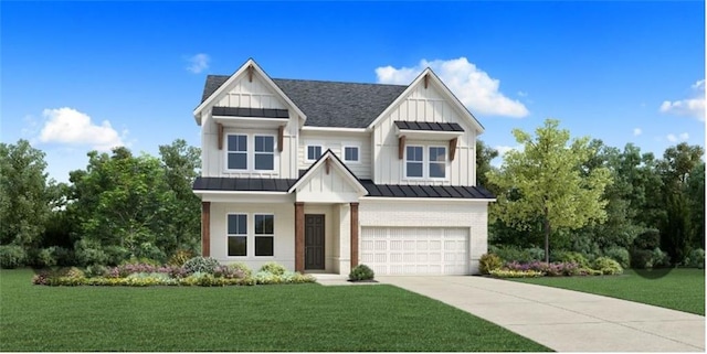 view of front of property with a front yard and a garage