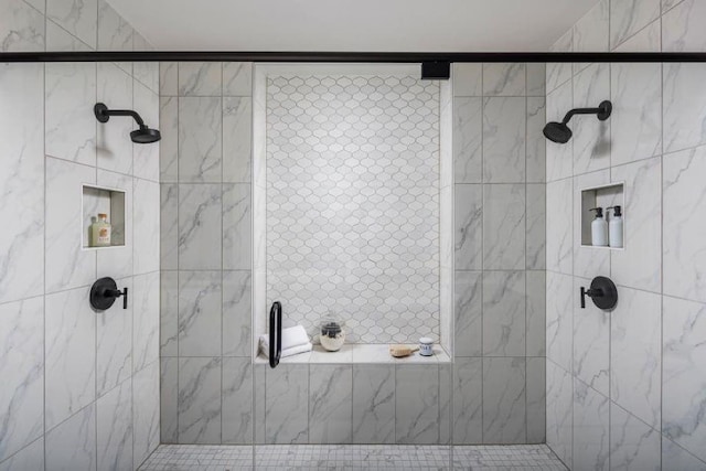 bathroom with a shower with shower door