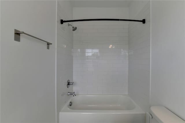 full bathroom with toilet and shower / bath combination