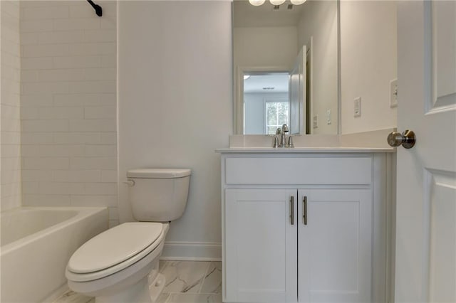 full bath featuring marble finish floor, toilet, vanity, and baseboards