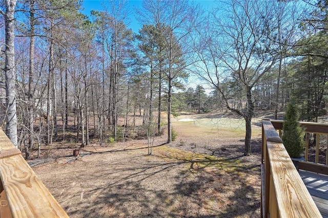 view of yard with a wooden deck