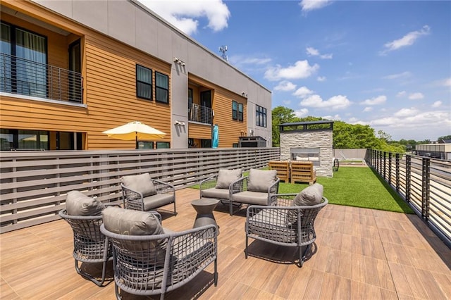 deck featuring outdoor lounge area