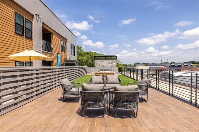 view of patio / terrace with outdoor dining area and a balcony